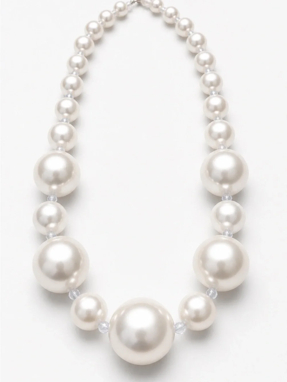 Giant White Pearlescent faux Pearls with Swarovski beads.
